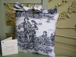 A traditional genuine French Pastorale toile cushion measures 10" x 10" and complemented with crisp white cotton fabric to the rear and finished off with two bows on the top.
 Price: &pound;13.54