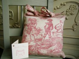 Made using genuine French toile from Paris. Our Agnes cushion measures 10" x 10" and complemented with a thick antique cream and beige thick woven silk to the rear and finished off with two bows on the top. 
 Price: &pound;13.54