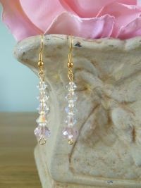 Beautiful, but very affordable all Swarovski crystal earrings with a larger pink crystal strung to a gold plated mount.
Price includes gift wrap and box. Price: &pound;10.58